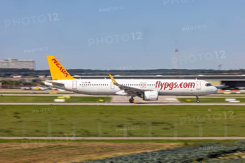 Stuttgart Airport with television tower and aeroplane on the runway. Aircraft registration number: TC-RBU, Pegasus, Airbus A321neo. Stuttgart, Baden-Württemberg, Germany