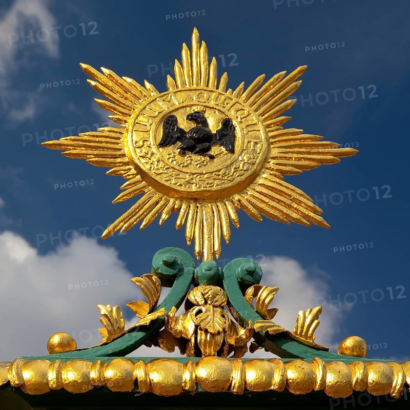 Golden star with black eagle and the Latin inscription suum cuique, to each his own, detail on the fence, Charlottenburg Palace, Berlin, Germany