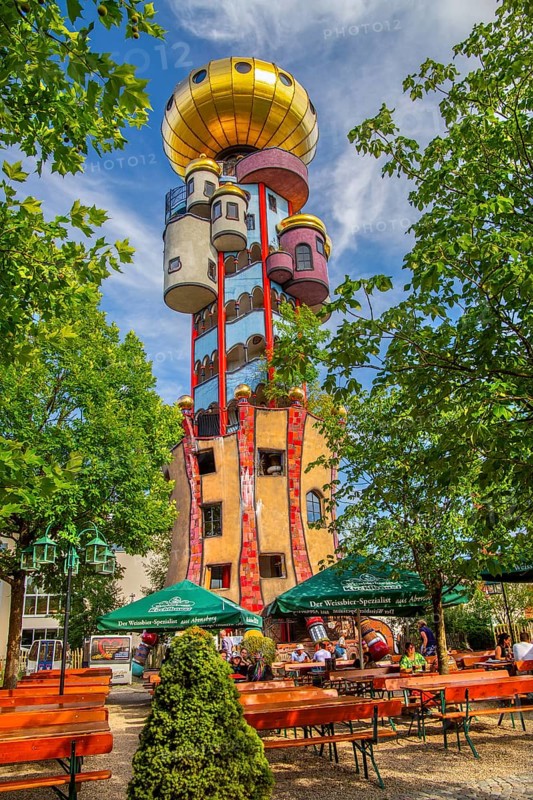 Beer garden of the Kuchlbauer brewery in front of the Kuchlbauer tower by architect Friedensreich Hundertwasser, Abensberg, Lower Bavaria, Bavaria, Germany