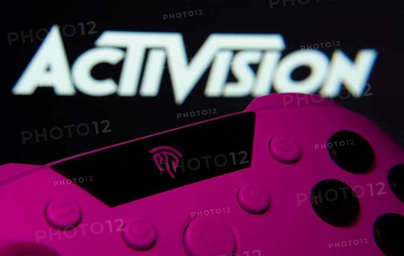 Dhaka, Bangladesh- 23 Sep 2025: A close-up of a gamepad with the Activision seen on screen in the background