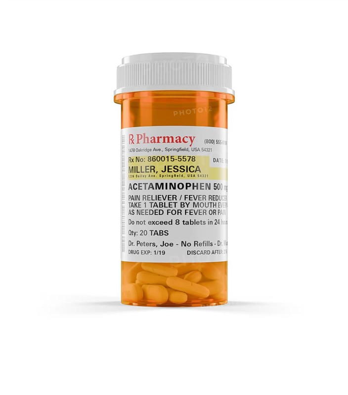 Acetaminophen prescription medicine bottle and pills isolated on a white background. the label is non-proprietary - fictional - made specifically for the stock photo industry