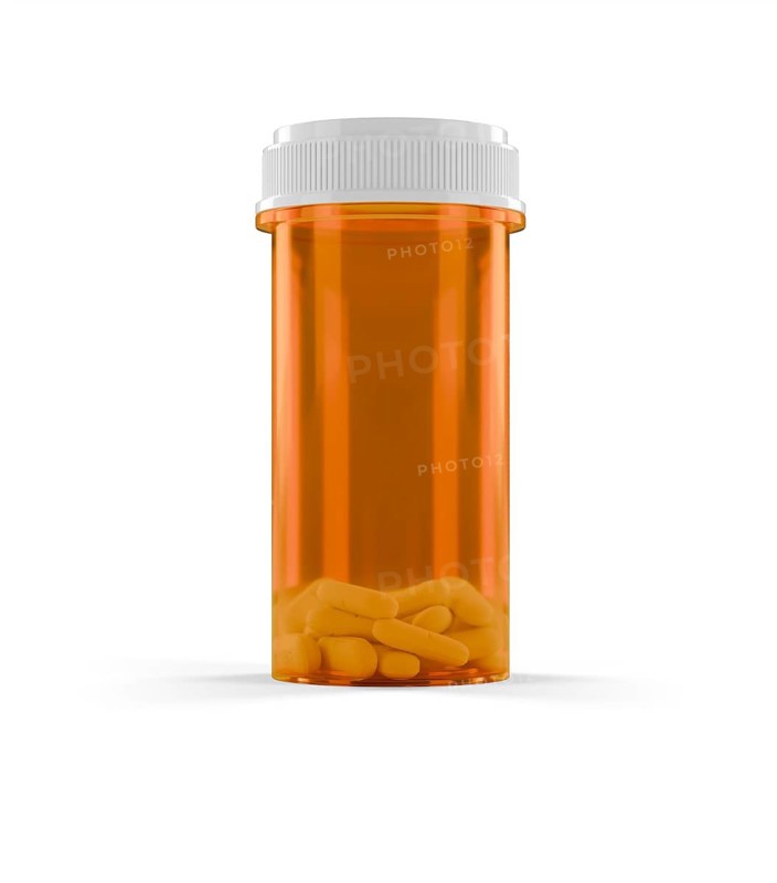 Blank prescription medicine bottle and pills isolated on a white background
