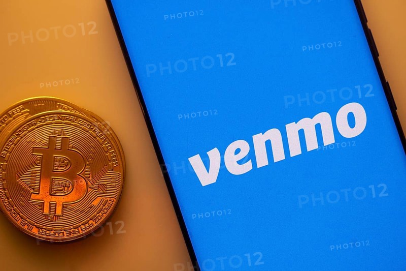 A Bitcoin and Venmo logo on a blue screen representing cryptocurrency