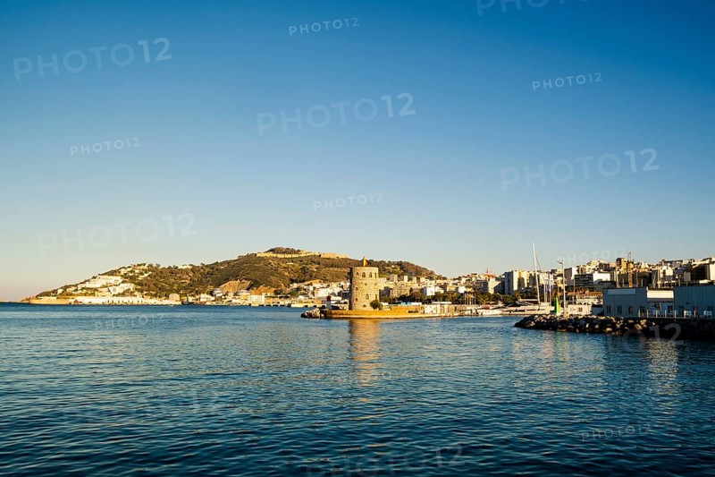 Beautiful view of historic lighthouse by sunset in Ceuta, Spain