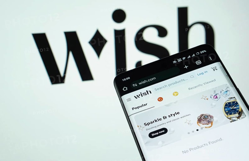 Dhaka, Bangladesh- 03 July 2025: Smartphone displaying Wish web interface against wish logo background