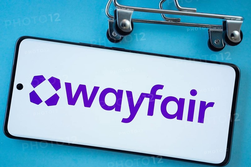Dhaka, Bangladesh- 03 July 2025: Smartphone screen showing the Wayfair logo with shopping cart wheels on a blue background