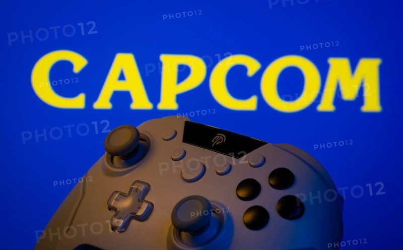 Dhaka, Bangladesh- 15 Sep 2025: A close-up of a gamepad with the Capcom seen on screen in the background