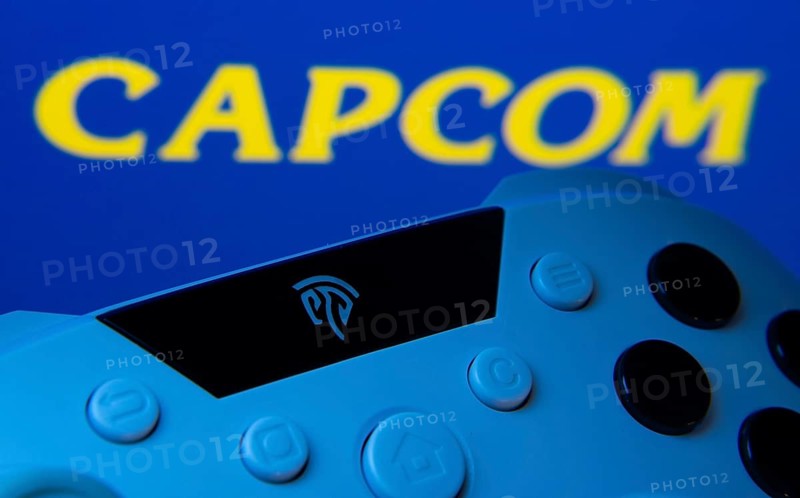 Dhaka, Bangladesh- 15 Sep 2025: A close-up of a gamepad with the Capcom seen on screen in the background
