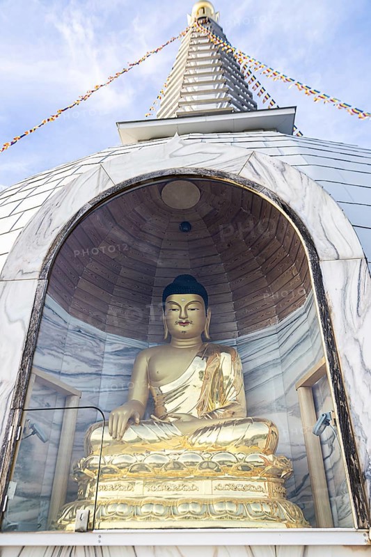 Golden Buddha statue in a stupa, meditating, surrounded by glass protection, Stupa am Wagram Grafenwörth Weinviertel Lower Austria Austria