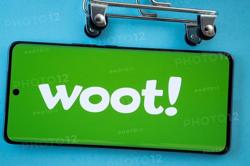Dhaka, Bangladesh- 03 July 2025: Smartphone screen showing the Woot logo with shopping cart wheels on a blue background