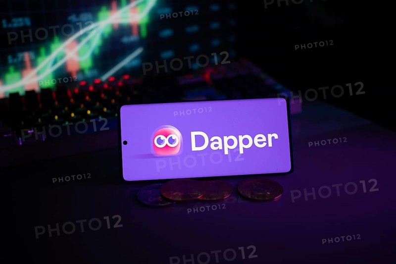 Dapper logo displayed alongside coins and illuminated trading charts, emphasizing digital finance