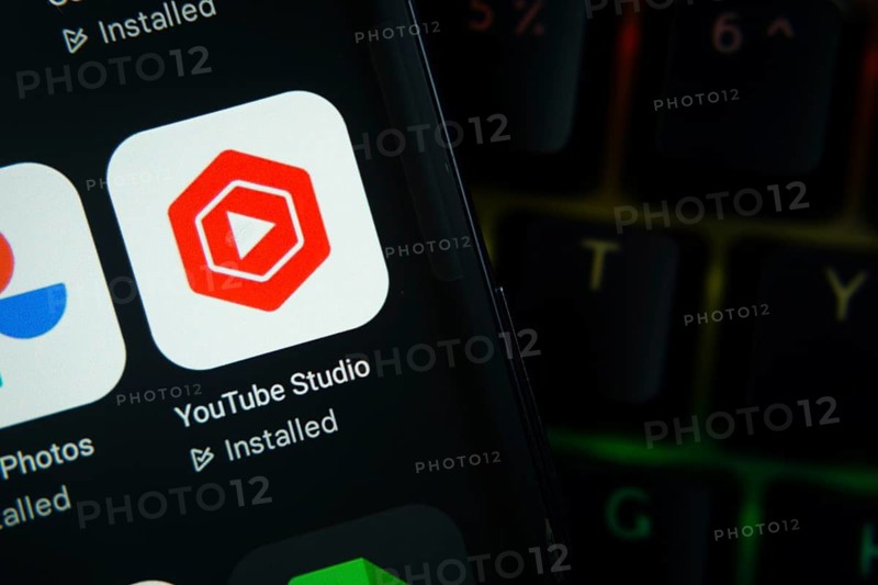 Dhaka, Bangladesh- 27 July 2025: Close-up of smartphone screen showing the youtube studio app icon with a dark interface
