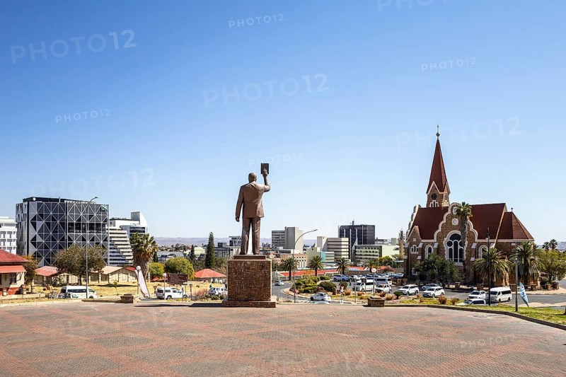 The bronze statue of Dr. Sam Nujoma and Christuskirche is a historic Lutheran church in Windhoek, Namibia - 11 August, 2025