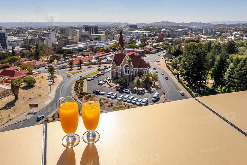 Windhoek Sky Restaurant is an upscale dining venue located on the 4th floor of the Independence Memorial Museum, a distinctive golden building near Parliament Gardens in Windhoek, Namibia