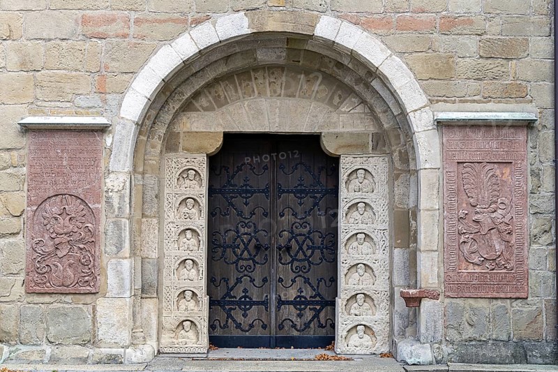 Historic stone door with reliefs and coats of arms, decorated medieval architecture, parish church St.Stephan Tulln Lower Austria Austria