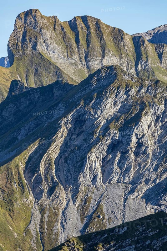 Layer folds in limestone, behind it the Schneck, 268m, Daumengruppe, Allgäu Alps, Allgäu, Bavaria, Germany