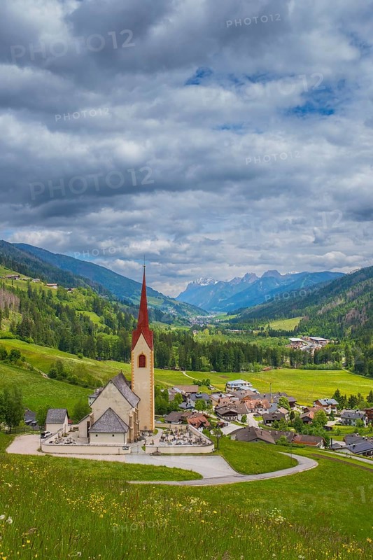 View of the church of Winnebach with the valley behind it, San Candido, Val Pusteria, Dolomites, South Tyrol, Italy