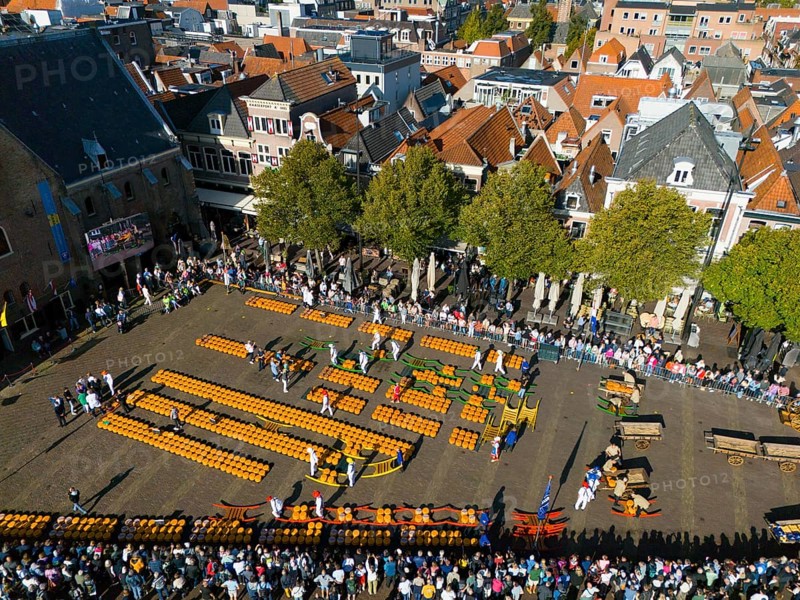 Aerial view of a busy marketplace with orange cheese and people, aerial view, cheese, cheese market, Alkmaar, Alkmar, Noord-Holland, Noord-Holland, Netherlands