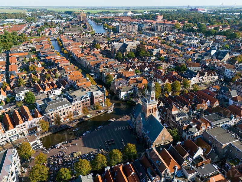 Expansive city view with a central church tower and neighbouring houses, aerial view, former city weigh house, market square, Alkmaar, Alkmar, Noord-Holland, North Holland, Netherlands