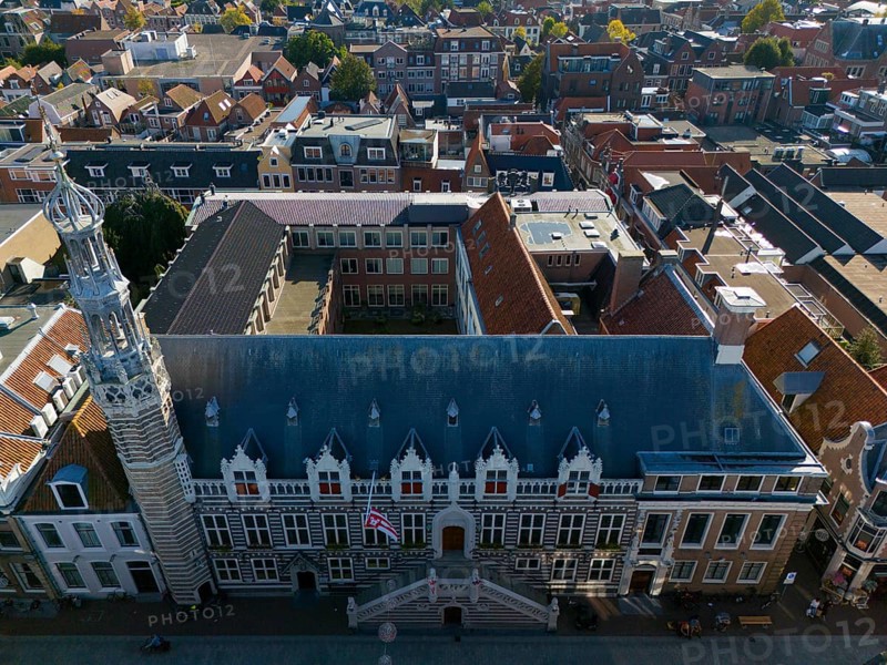 City view of a historic building with striking tower and red tiled roofs, aerial view, town hall, Alkmaar, Alkmar, Noord-Holland, North Holland, Netherlands