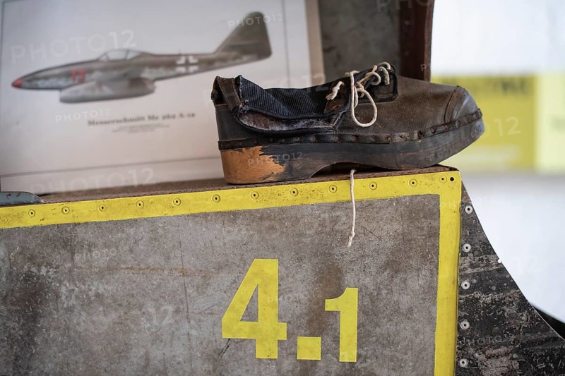 Wooden shoe of a forced labourer stands on aircraft wing, documentation centre in the old Engelberg tunnel, first motorway tunnel in Germany, 1944 and 1945 production site for wings, Messerschmitt Me 262 fighter aircraft, forced labour, station on the path of remembrance, Leonberg concentration camp memorial, Leonberg, Baden-Württemberg