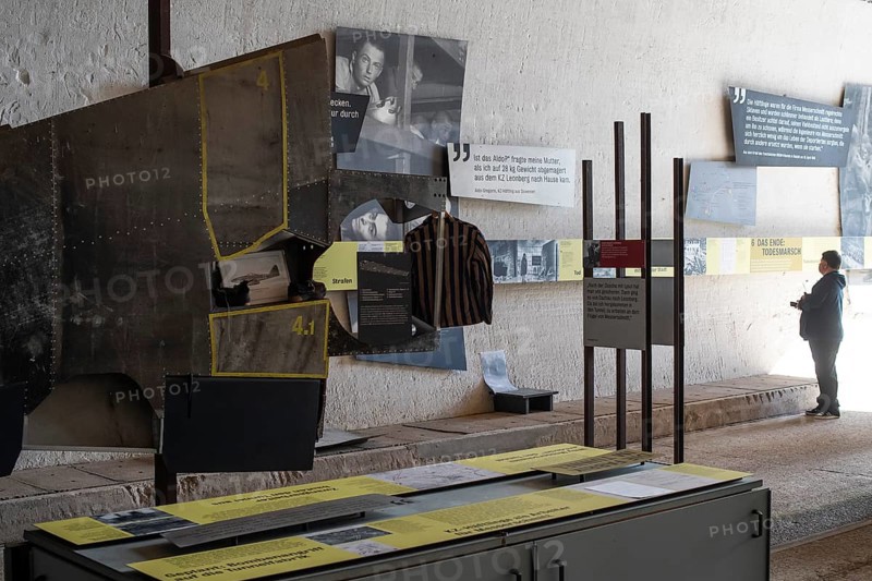 Visitor stands in the documentation centre in the old Engelberg tunnel, first motorway tunnel in Germany, 1944 and 1945 production site for wings, Messerschmitt Me 262 fighter aircraft, forced labour, station on the path of remembrance, Leonberg concentration camp memorial, Leonberg, Baden-Württemberg