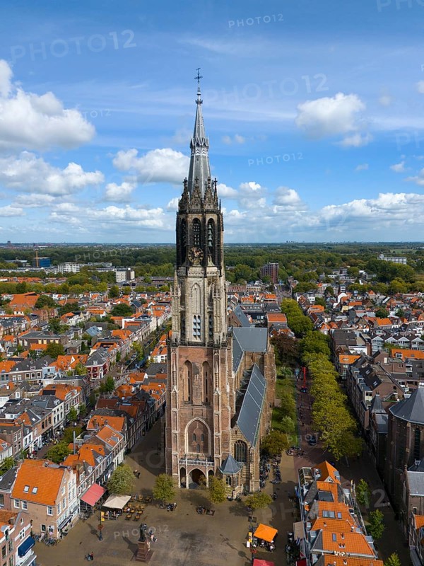 Aerial view of a church tower in the middle of a busy city with red roofs, Aerial view, Nieuwe Kerk, New Church, Market Square, Delft, Province of South Holland, Zuid-Holland, Netherlands