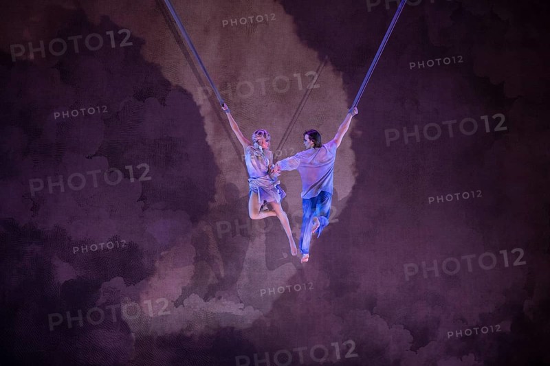 Two artists float at the press screening of Alizé, a joint production by Cirque du Soleil and Live Nation at the Theater am Potsdamer Platz, Berlin, 23/09/2025