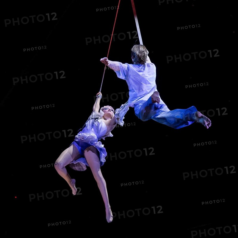 Two artists hover above the audience at the press screening of Alizé, a joint production by Cirque du Soleil and Live Nation at the Theater am Potsdamer Platz, Berlin, 23/09/2025