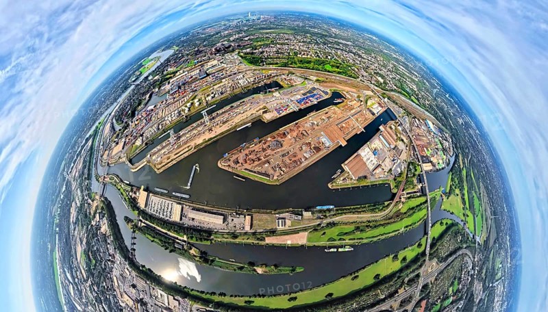 Aerial view, Duisburg-Ruhrort harbour with oil island, coal island and scrap island, A59 motorway, Ruhr river and Rhine-Herne canal, globe, fisheye image, fisheye image, 360 degree image, tiny world, little planet, fisheye image, Ruhrort, Duisburg, Ruhr area, North Rhine-Westphalia, Germany, DE, Europe, fisheye lens, fisheye lens, harbour, harbour area, harbour overview, Little Planet, aerial view, aerial photography, aerial photography, super wide angle lens, Tiny World, overview, bird's eye view, globe, birds-eyes view, duisport, fisheye lens, insta360 camera, overview