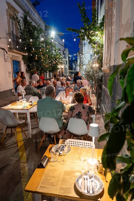 Gastronomy, restaurants in Tavira, old town, partly streets, alleys are closed and serve as terraces for the restaurants, in the east of the Algarve, Portugal