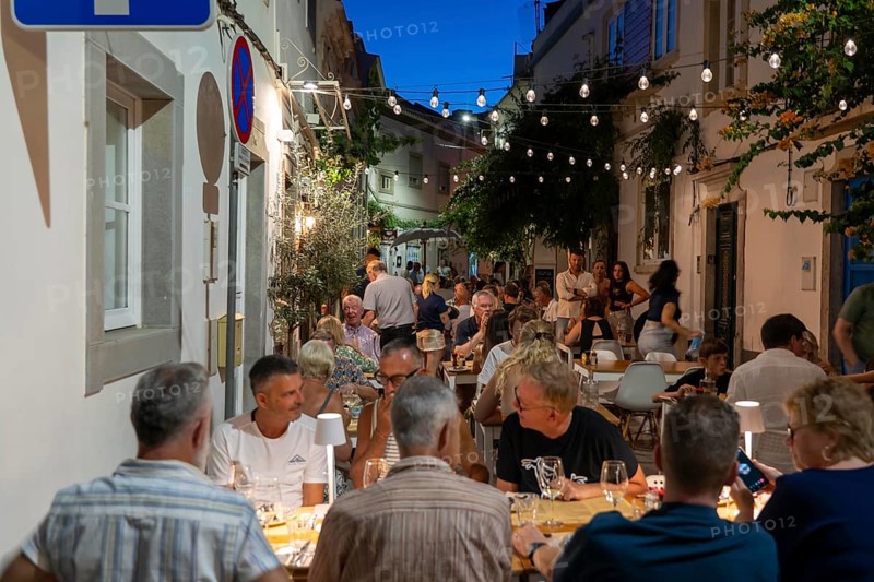 Gastronomy, restaurants in Tavira, old town, partly streets, alleys are closed and serve as terraces for the restaurants, in the east of the Algarve, Portugal