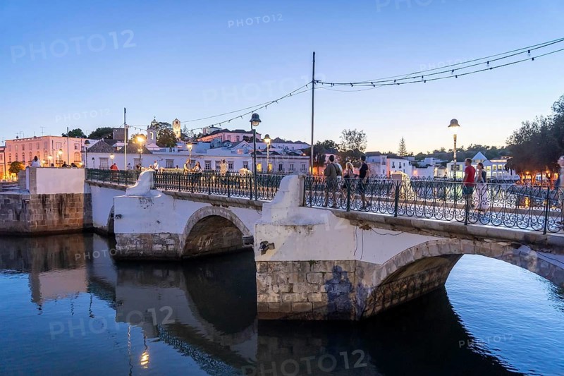 The seven-arched bridge over the Rio Gilão, in Tavira, old town, in the east of the Algarve, Portugal