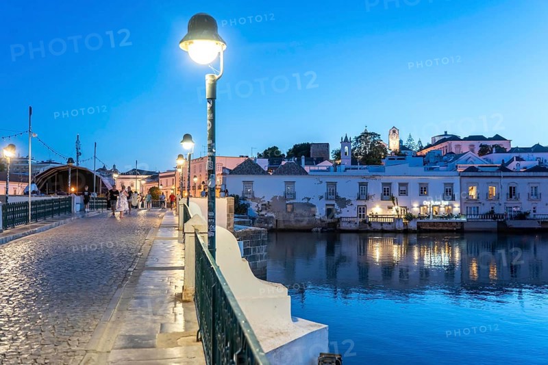 The seven-arched bridge over the Rio Gilão, in Tavira, old town, in the east of the Algarve, Portugal