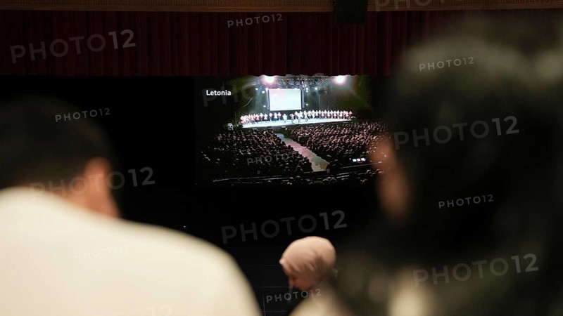 Audience members gather inside the theater before the start of the Fire of Anatolia show in Gaziantep. The Turkish dance ensemble, founded by Mustafa Erdogan, is one of the largest in the world with more than 120 dancers, Gaziantep, Gaziantep, Türkiye