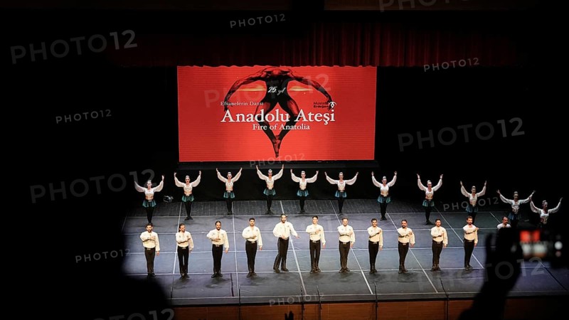 Members of Fire of Anatolia, also known as Anadolu Atesi, bow to the audience after their performance at Gaziantep University. The troupe enjoys worldwide fame and holds Guinness World Records for its achievements, Gaziantep, Gaziantep, Türkiye