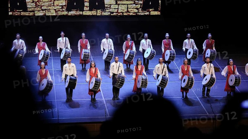 Dozens of members of Fire of Anatolia perform a drumming sequence during a cultural festival at Gaziantep University. The troupe is one of the largest dance ensembles in the world and includes 120 members, Gaziantep, Gaziantep, Türkiye