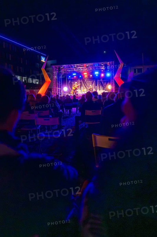 A night-time open-air concert with bright lights and a lively atmosphere, Sindelfingen, Böblingen district, Germany