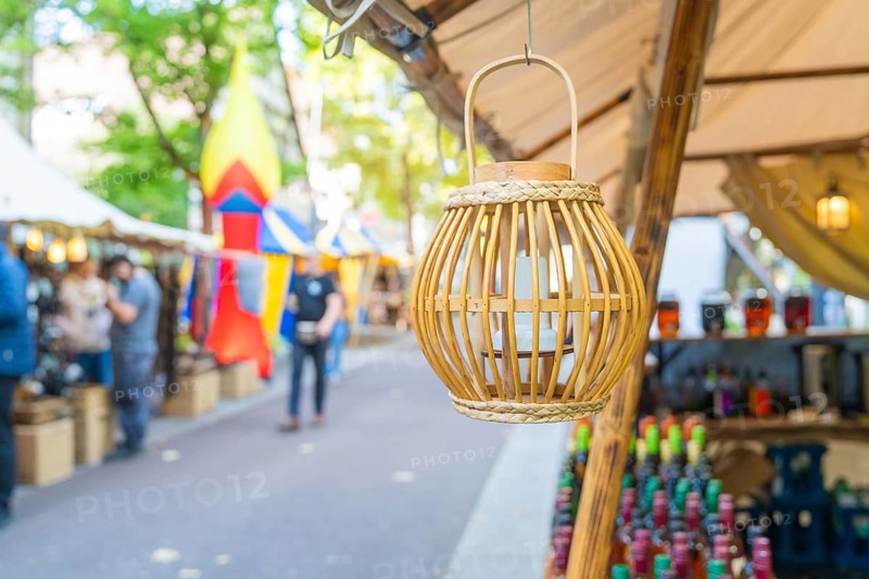 Decorative wooden lantern at a market with colourful stalls, Sindelfingen, Böblingen district, Germany