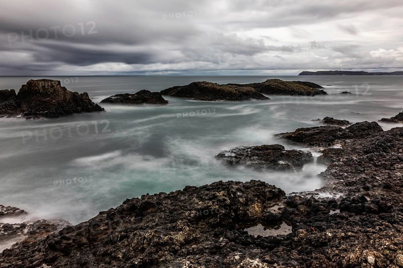 Rocky coast, offshore islands, Ballintoy Harbour, Causeway Coastal Route, Antrim, Northern Ireland, Great Britain