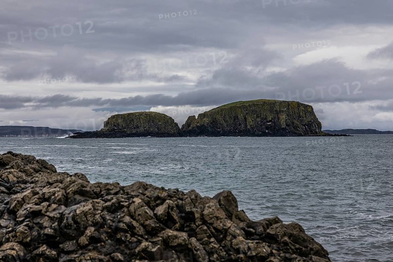 Rocky coast, offshore islands, Ballintoy Harbour, Causeway Coastal Route, Antrim, Northern Ireland, Great Britain