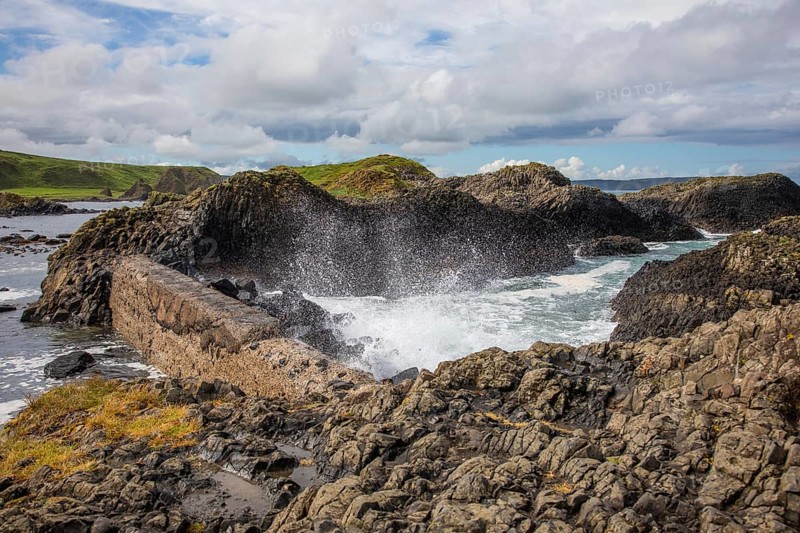Breakwater at the fishing harbour, Ballintoy Harbour, Causeway Coastal Route, Antrim, Northern Ireland, Great Britain