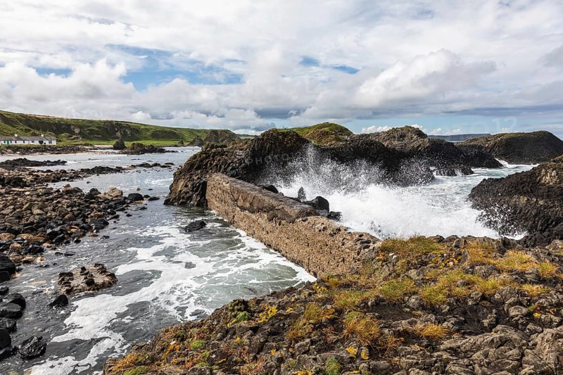 Breakwater at the fishing harbour, Ballintoy Harbour, Causeway Coastal Route, Antrim, Northern Ireland, Great Britain