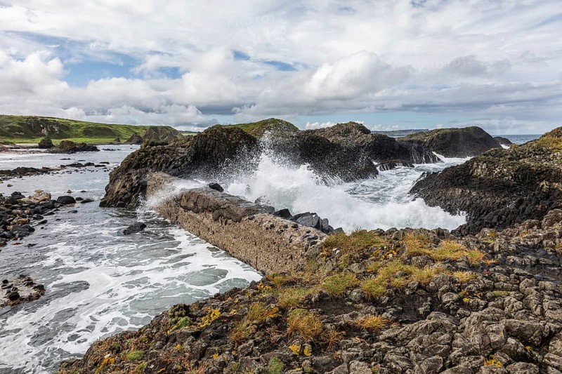Breakwater at the fishing harbour, Ballintoy Harbour, Causeway Coastal Route, Antrim, Northern Ireland, Great Britain