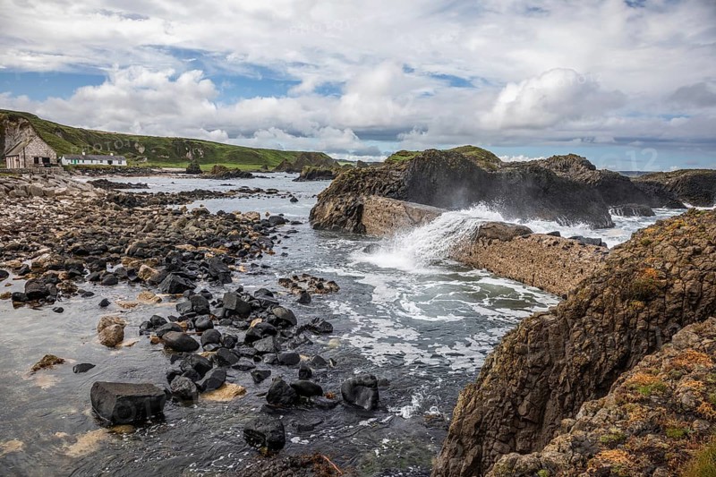Breakwater at the fishing harbour, Ballintoy Harbour, Causeway Coastal Route, Antrim, Northern Ireland, Great Britain