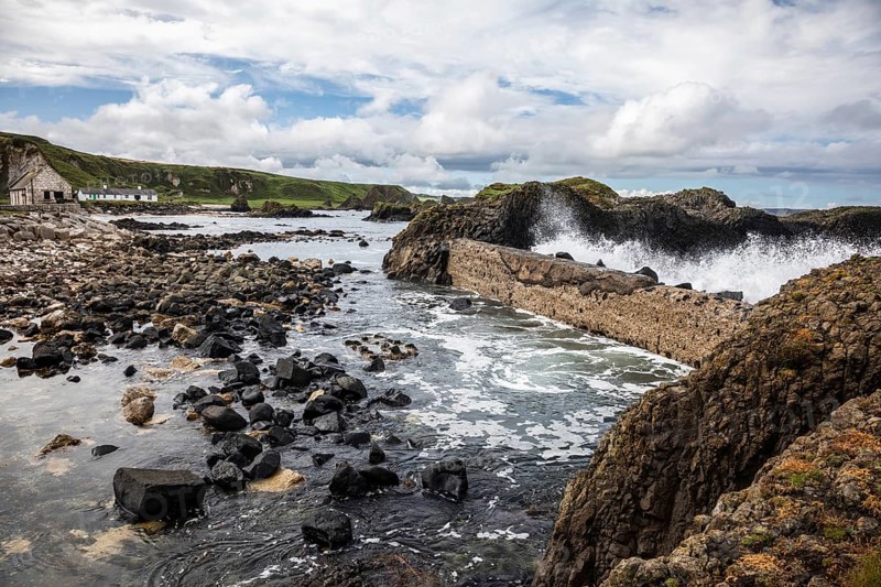 Breakwater at the fishing harbour, Ballintoy Harbour, Causeway Coastal Route, Antrim, Northern Ireland, Great Britain