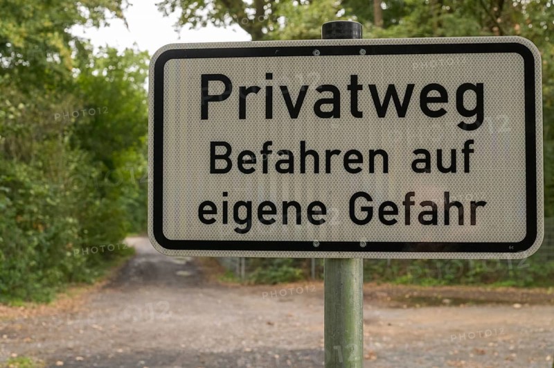 Borken, NRW, Germany, German sign warning people about entering a private road at their own risk