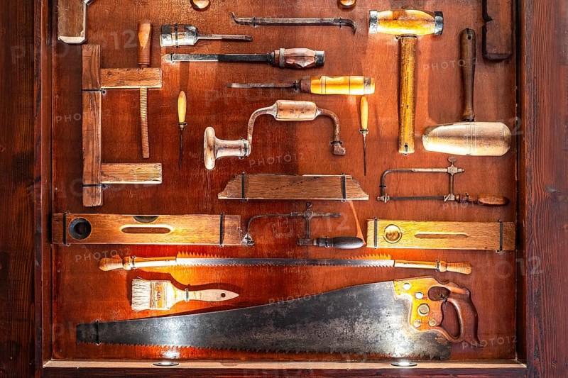 Plenty of different carpenter's tools exhibited and illuminated in the museum, Malta