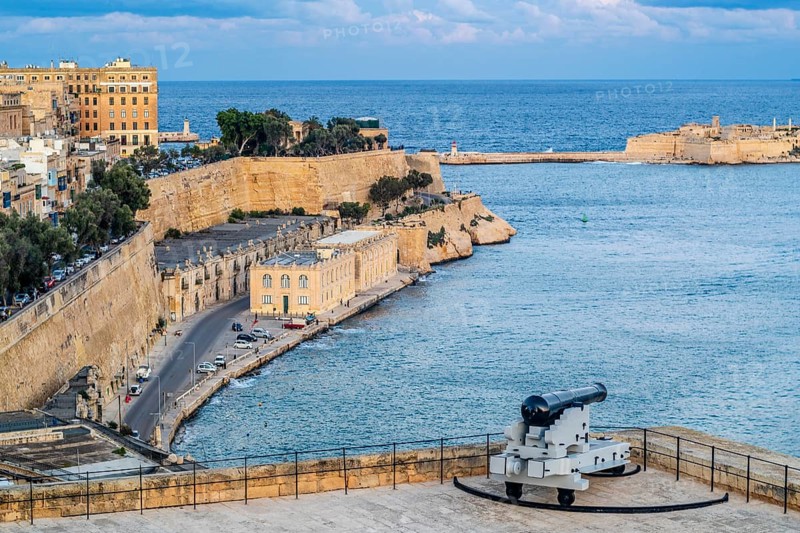 Seafront view of historic La Valletta with Lower Barrakka gardens, taken from Upper Barrakka garden, capital city, Malta