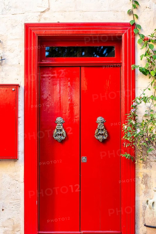 Wooden red doors in La Valletta, capital city of Malta